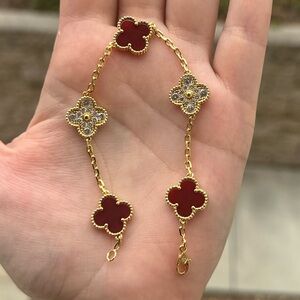 Elegant Gold and Red Clover Bracelet
